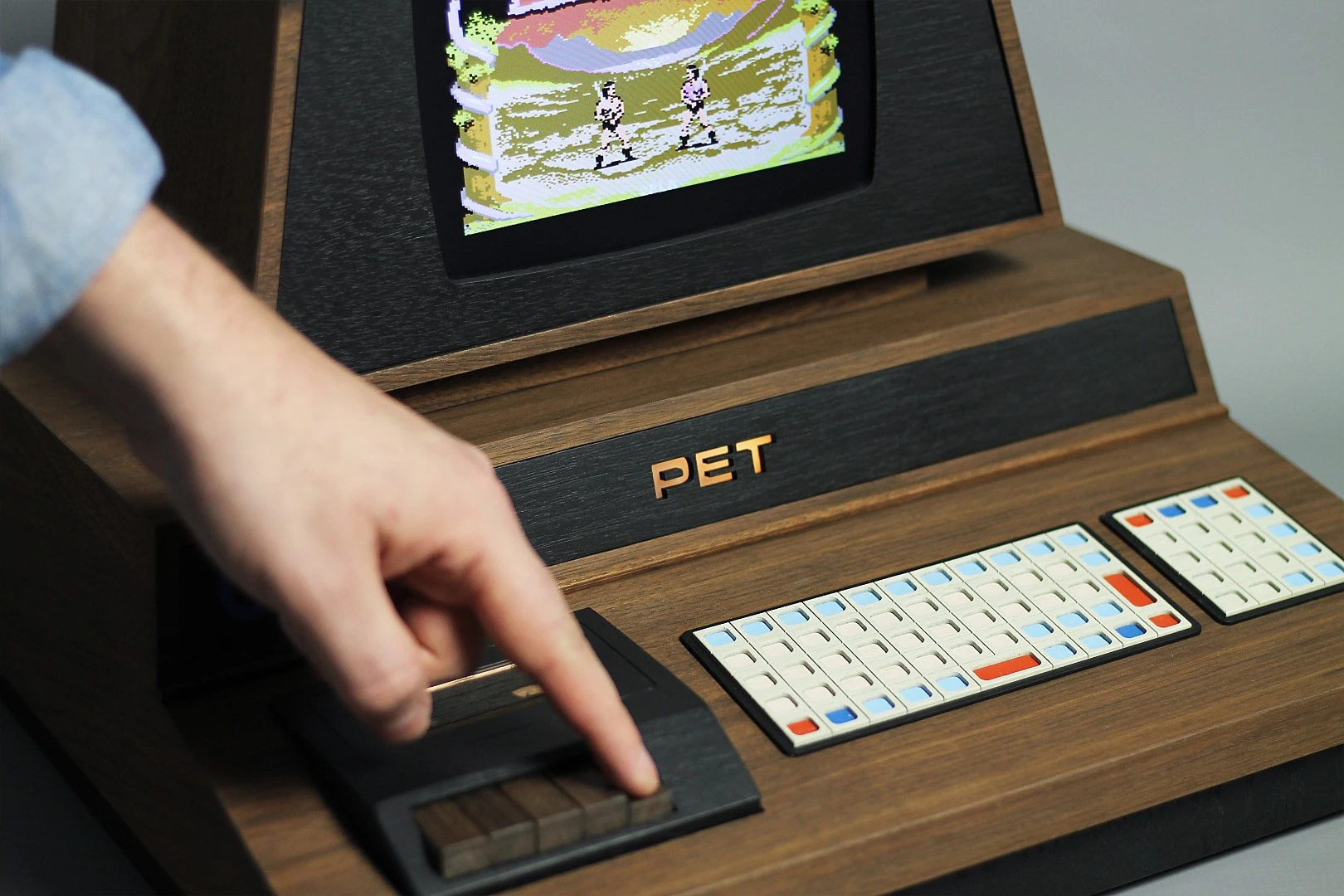 Games are loaded into the PET De Lux computer using the cassette player