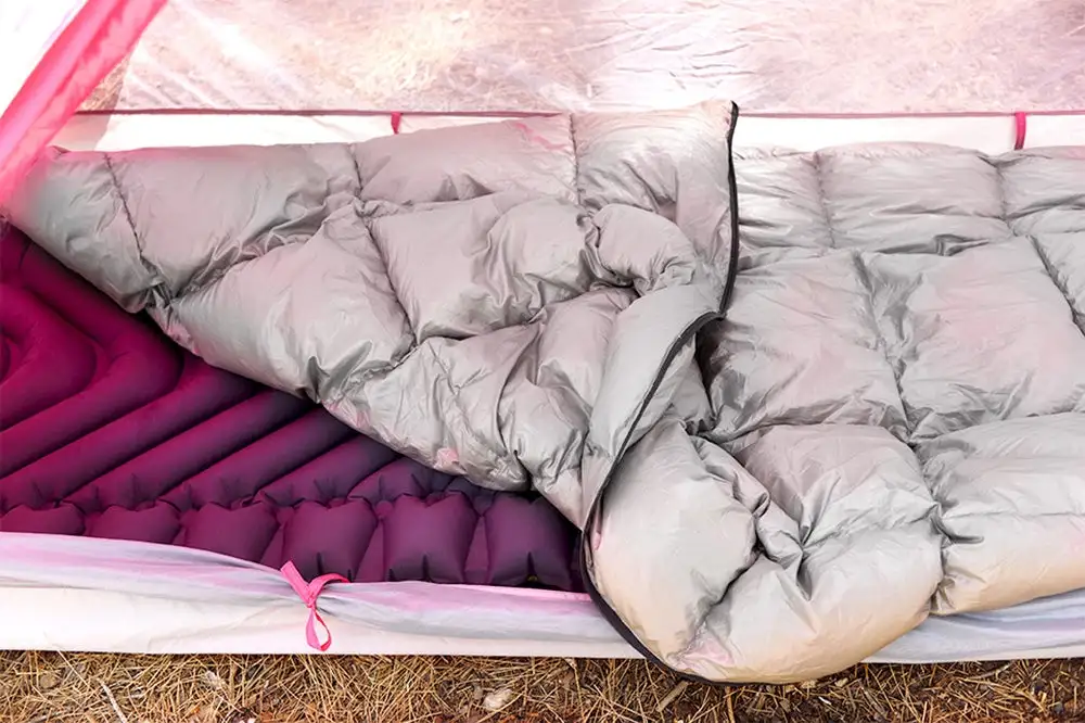 The RhinoWolf has been designed to work with a Klymit inflatable pad and a quilt