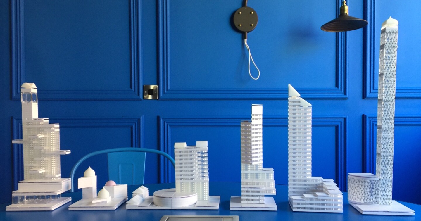 The Masterplan kit includes white and clear components like a proper architectural model