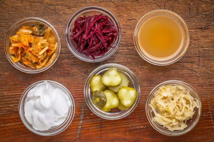 It is hypothesized that about 10 million years ago we evolved the ability to safely eat older fermenting food picked up off the ground