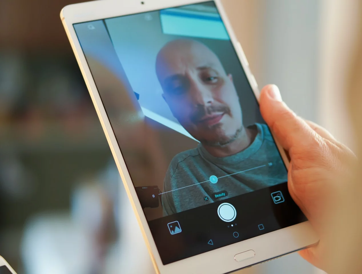 The mini-tablet makes sense as a selfie-machine, with 8 MP front-facing camera and auto-touchup features