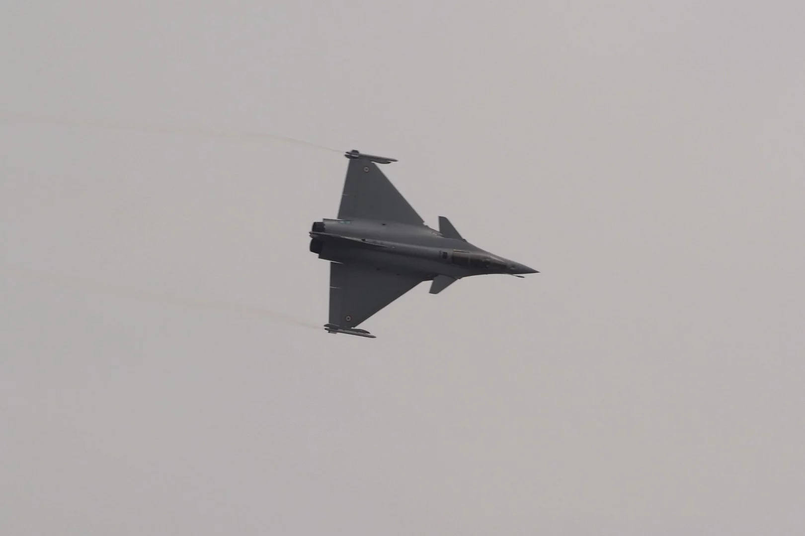 A Dassault Rafale against a gloomy gray Le Bourget sky