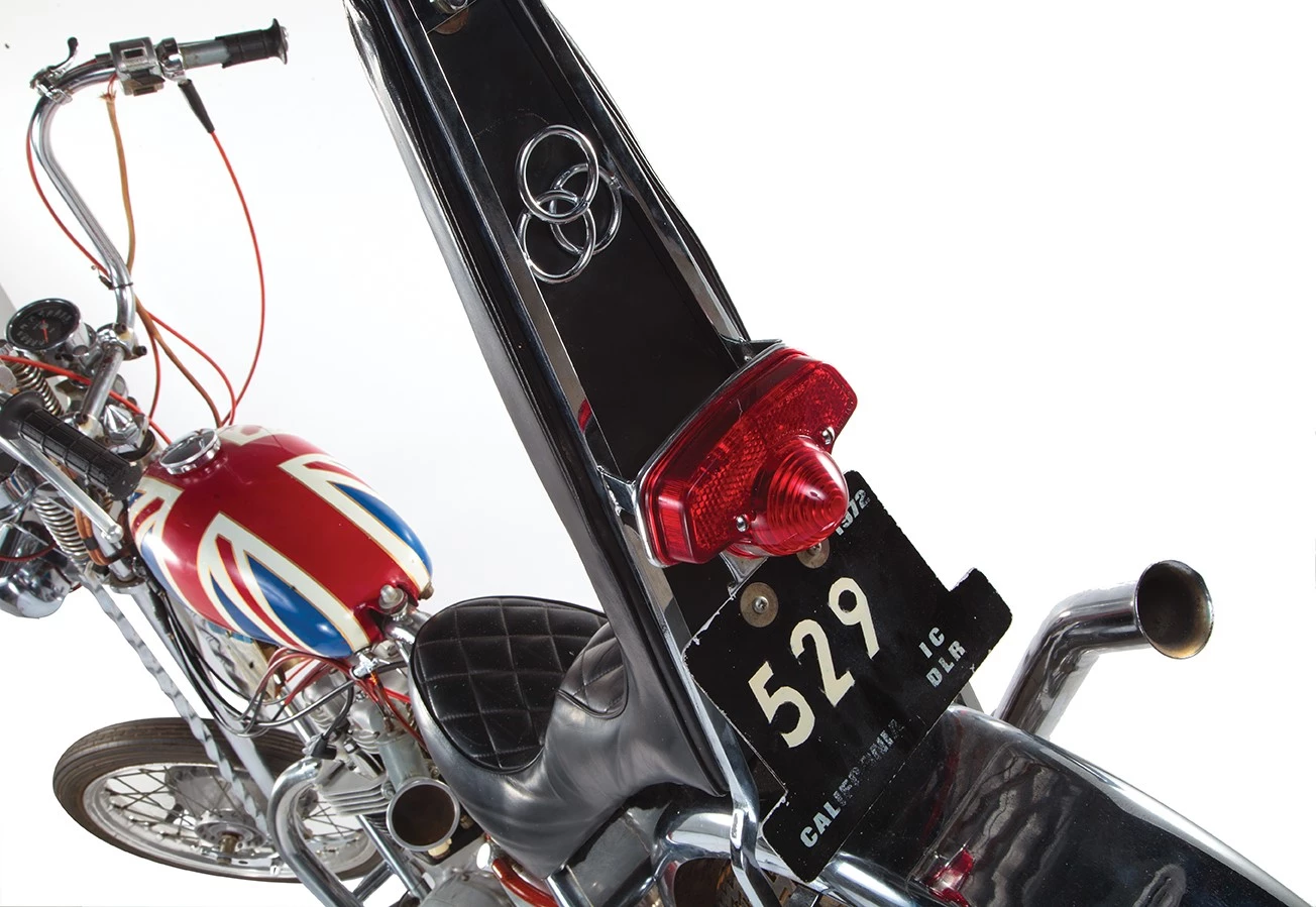This is the custom Triumph “Sunset Tripper” chopper ridden in the epic documentary film The Song Remains the Same. Led Zeppelin commissioned Ron Hagest, owner of California-based Burbank Customs, to create Triumph-based choppers for each of the band members and this bike was built for drummer John Bonham, inspired by the “Captain America” chopper from Easy Rider.