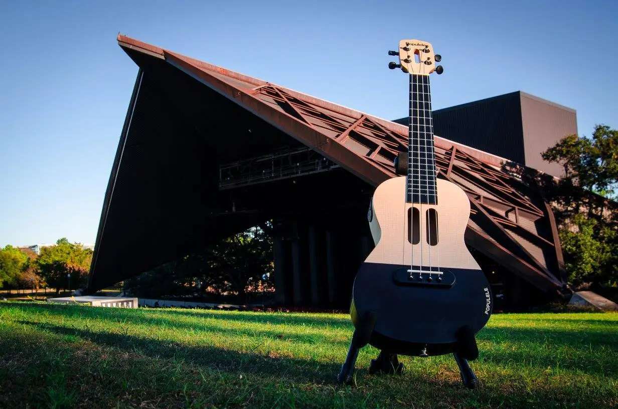 The Populele is constructed from maple, with a spruce sound board and ABS plastic fretboard
