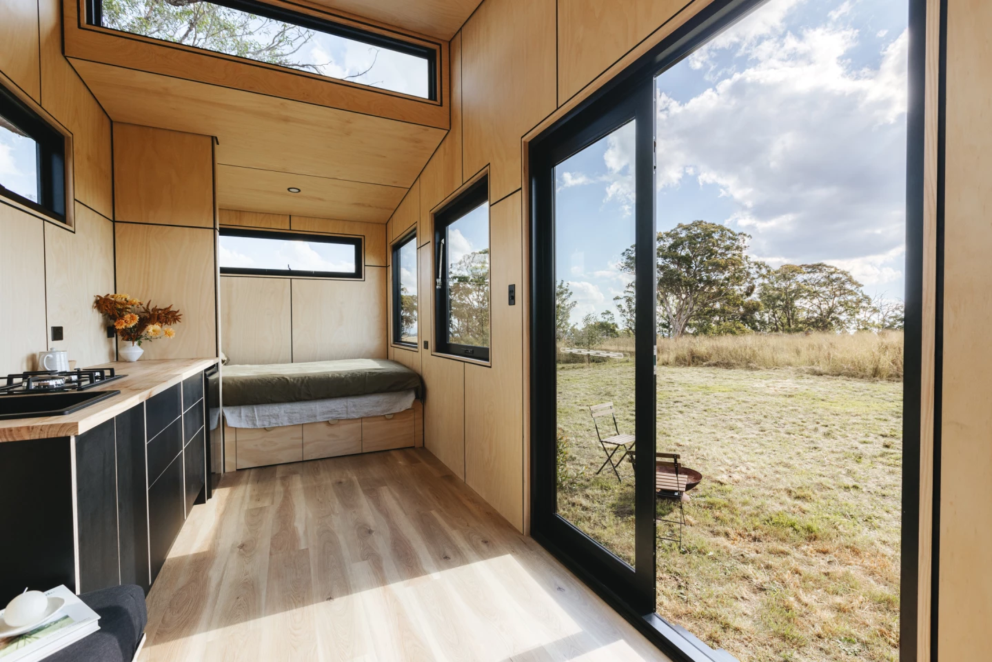 The Sun Valley's bedroom includes a double bed and some integrated storage space