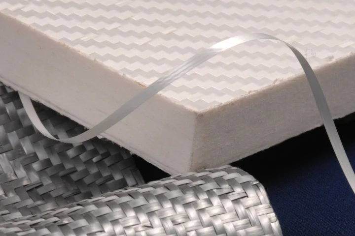 Whilst having similar properties to carbon fiber, Tegris won't shatter on impact, is approximately a tenth the cost, and is fully recyclable