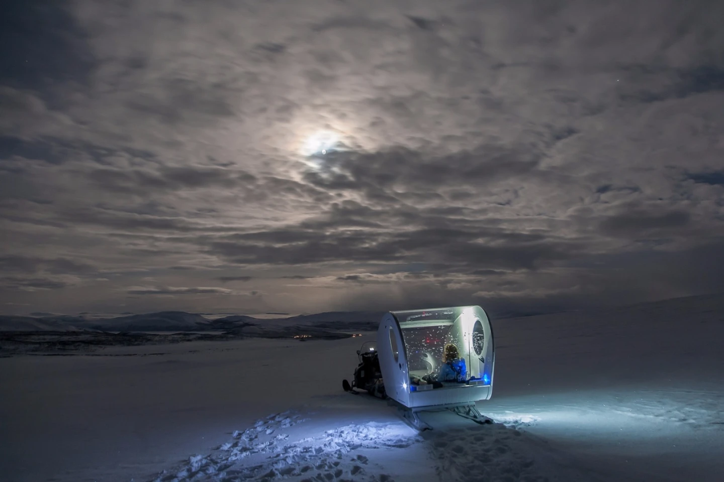 The Aurora Bubble Sled has 180-degree polycarbonate roof providing front-to-back views of the surroundings and glass fibre porthole windows providing views out of the sides