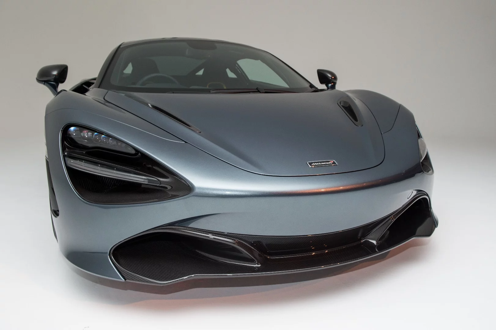 The carbon splitter on the 720S feeds air to the radiators at the back of the car