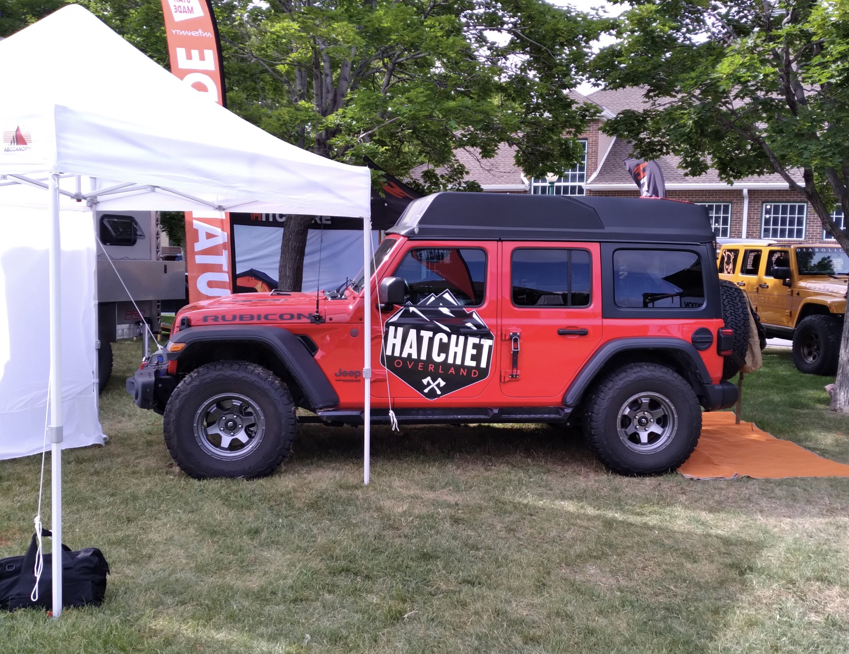 Hatchet hacks Jeep Wrangler into poptop overland microcamper