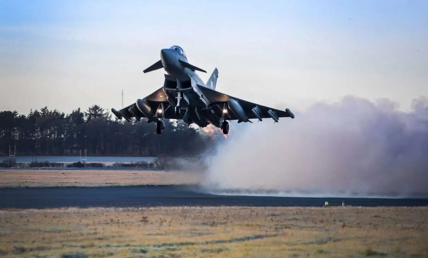 An RAF Typhoon equipped with Meteor missiles takes off from RAF Lossiemout