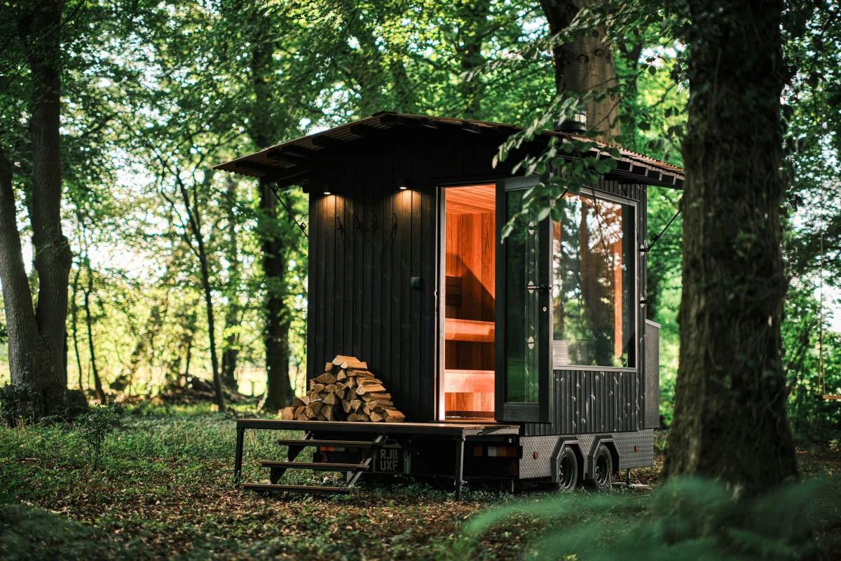 Though it looks a lot like a tiny house at first glance, the Aquila Sauna is actually a towable sauna that seats up to six people