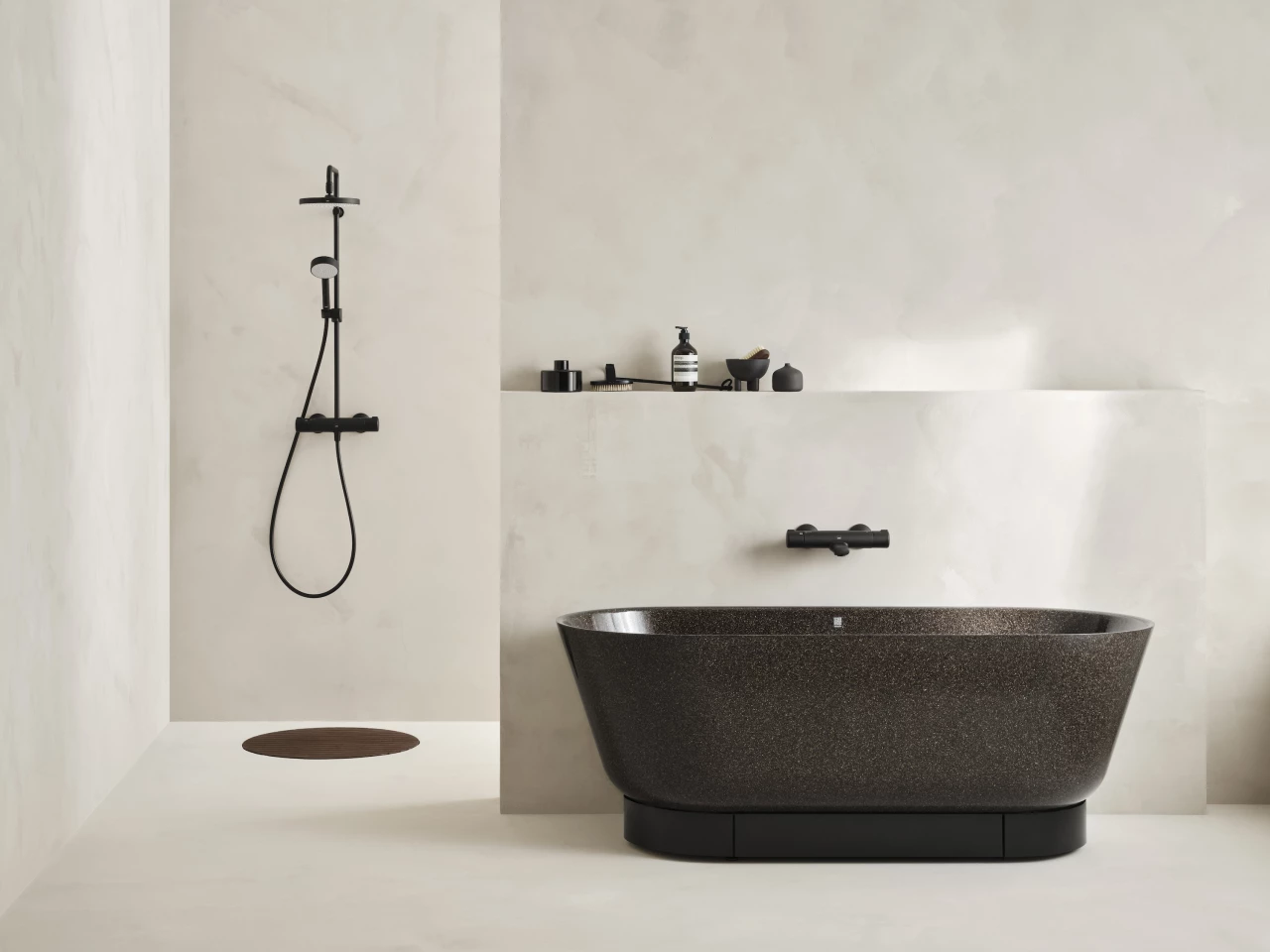 Woodio manufactures different types of composite wood bathroom ware, including a bathtub and a sink