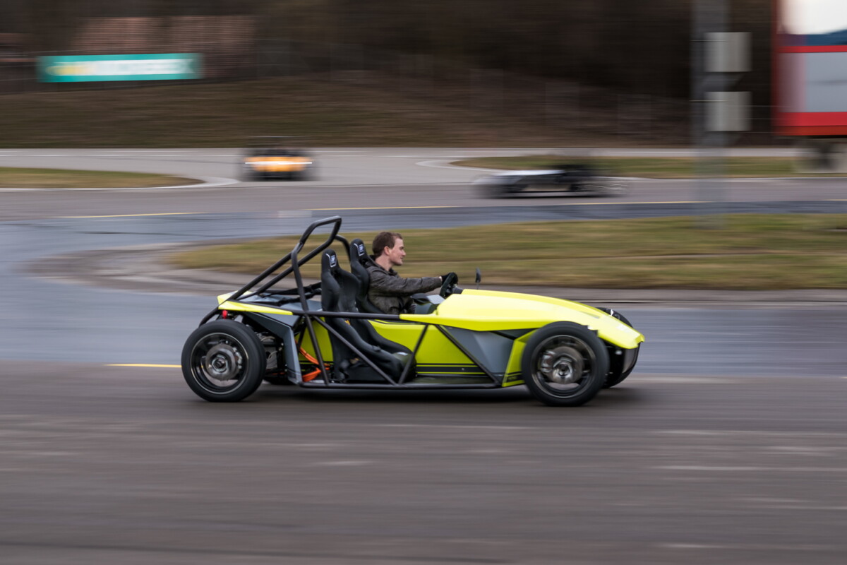 Behind The Wheel Of The No Frills Erod Electric Sports Car Includes motorized rod, remote control, wall adapter with 12 feet cord and all mounting hardware. no frills erod electric sports car