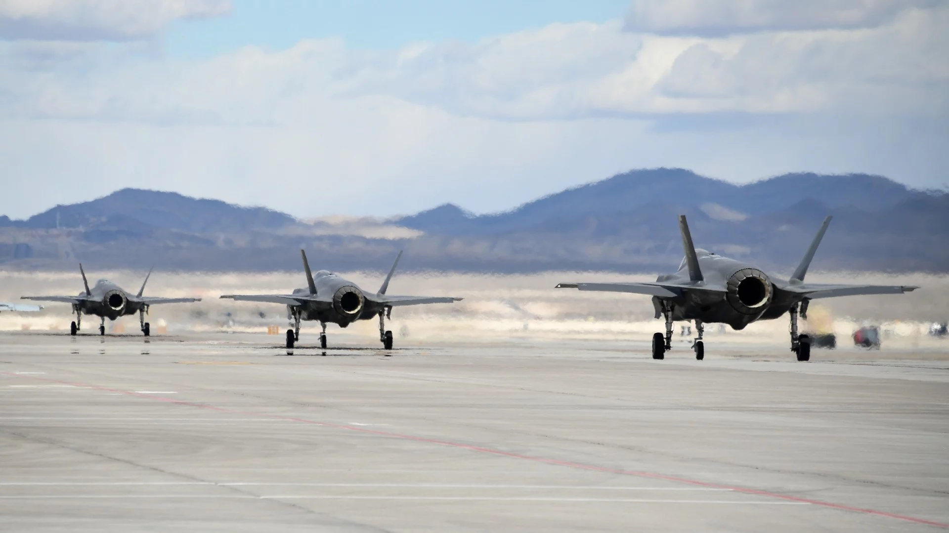 F-35A Lightning II fighter jets assigned to the 388th Fighter Wing's 4th Fighter Squadron taxi during Red Flag 19-1