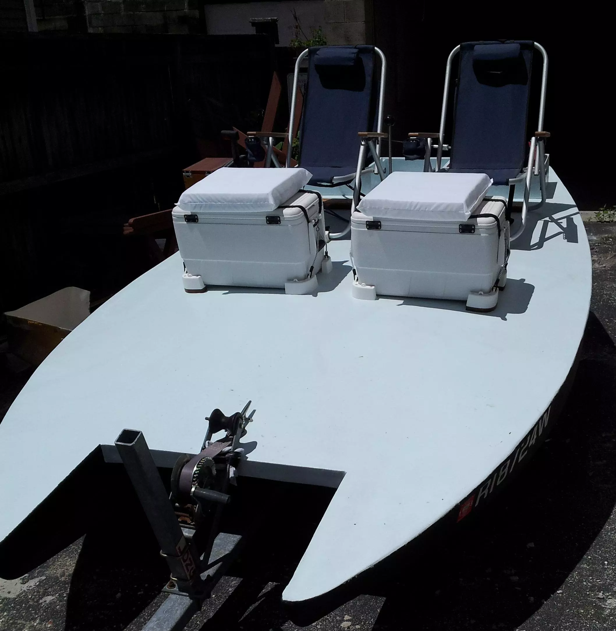 Two reclining chairs and personal coolers - just like a beach picnic