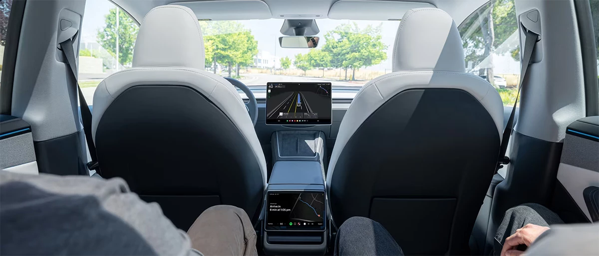At launch, Tesla Robotaxis have a safety operator in the front passenger seat