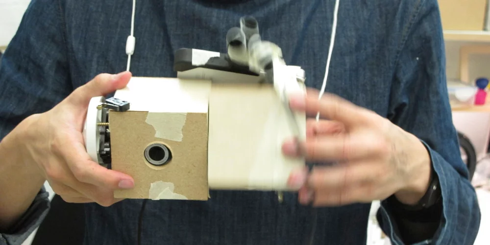 The designer told us he plans to develop the prototype further to include individual lenses and view screens for each half of the Duo