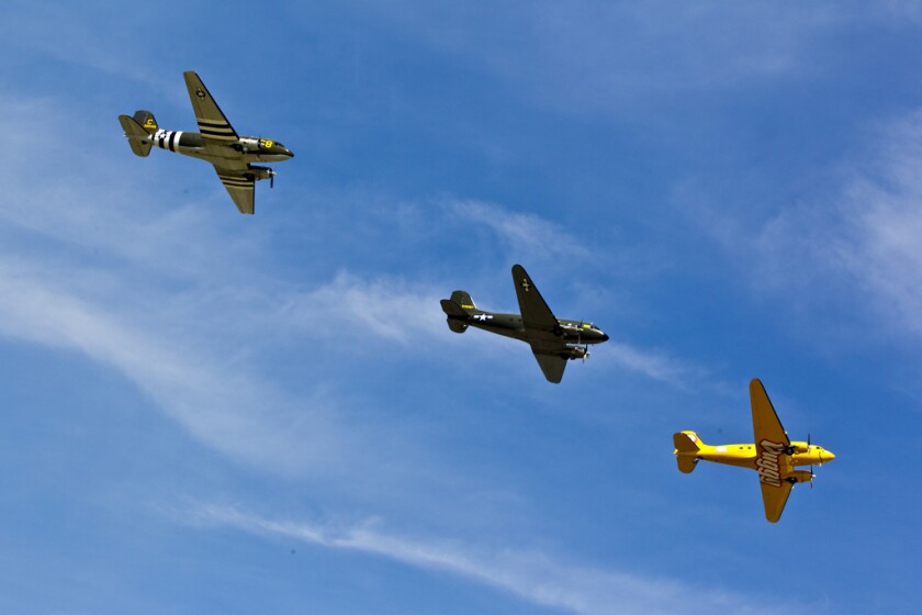 DC-3s take flight over EAA AirVenture (EAA photo/Amy Gesch)