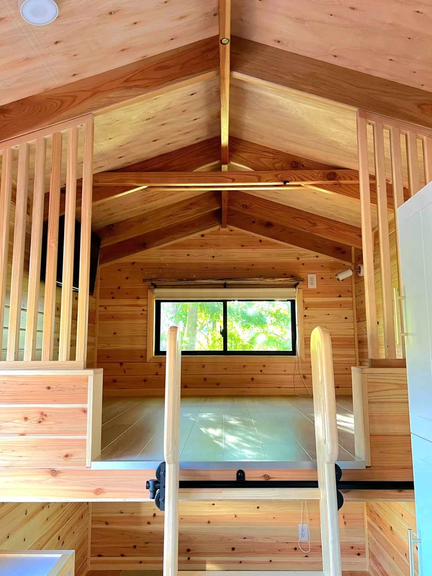 The Nozawa's bedroom is situated above the living room and is accessed by a removable ladder