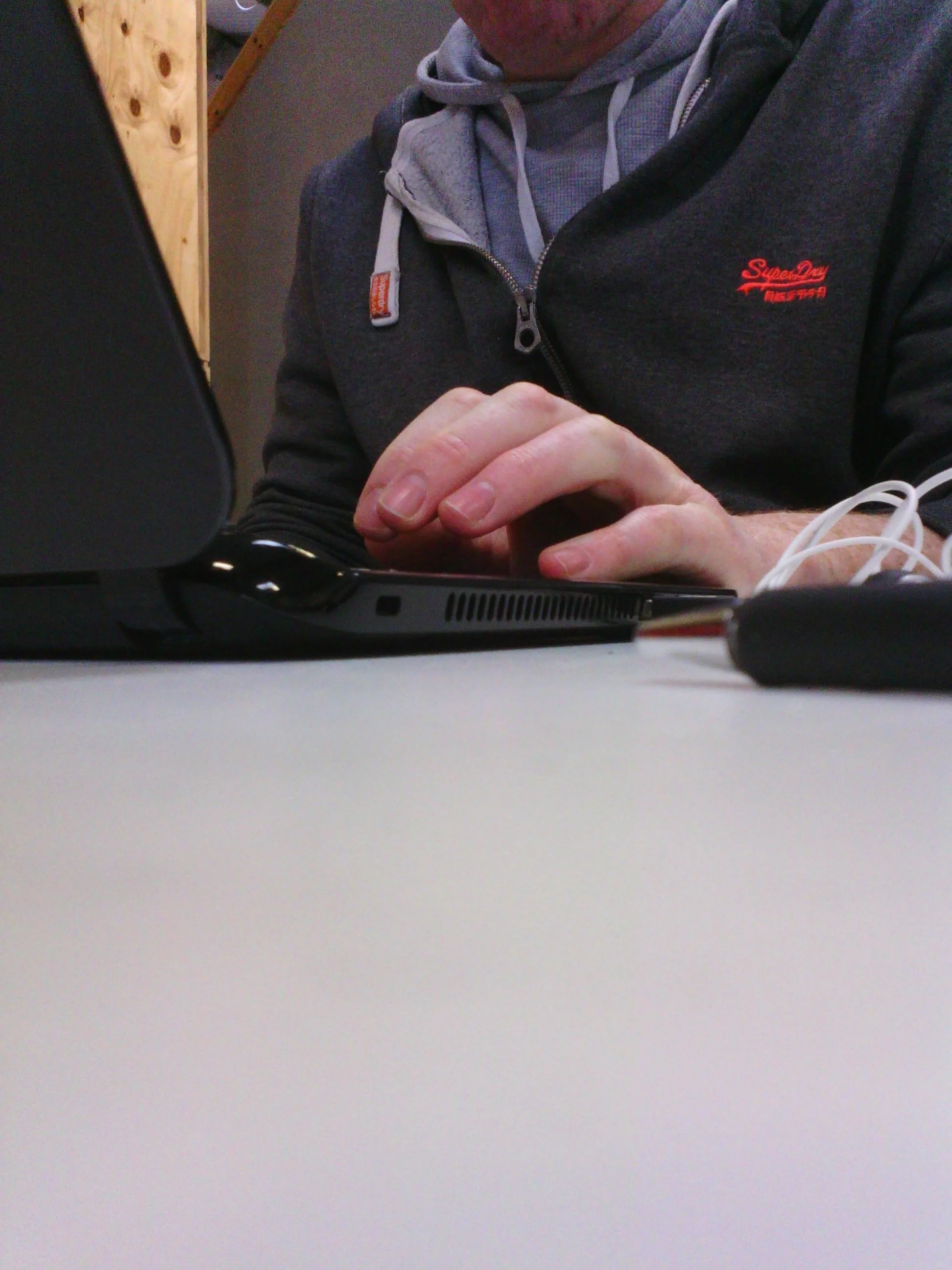 A picture taken with the device on a desk in a brightly lit office