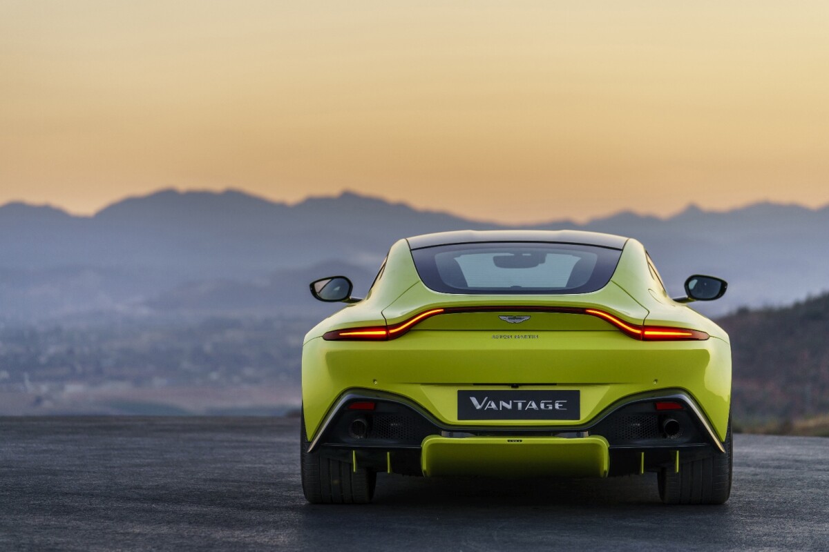 2018 Aston Martin Vantage: rear view, with unbroken light bar and diffusers on display