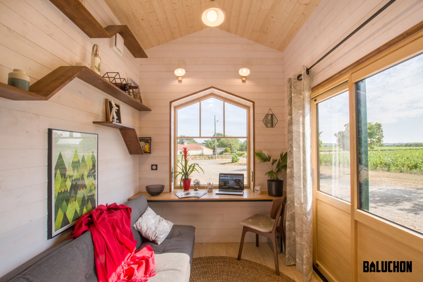 The Hauméa tiny house includes a home office area
