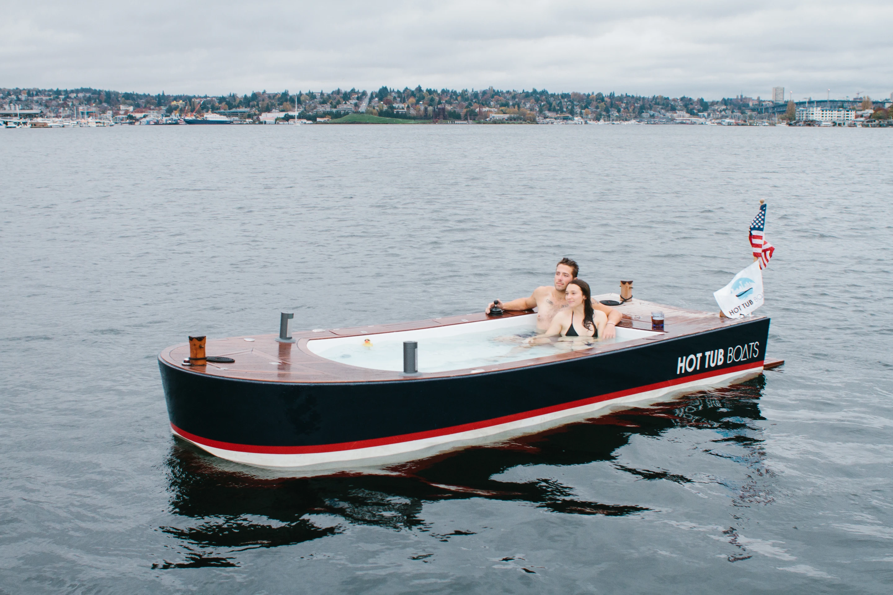 The Hot Tub Boat allows its passengers to soak while they cruise