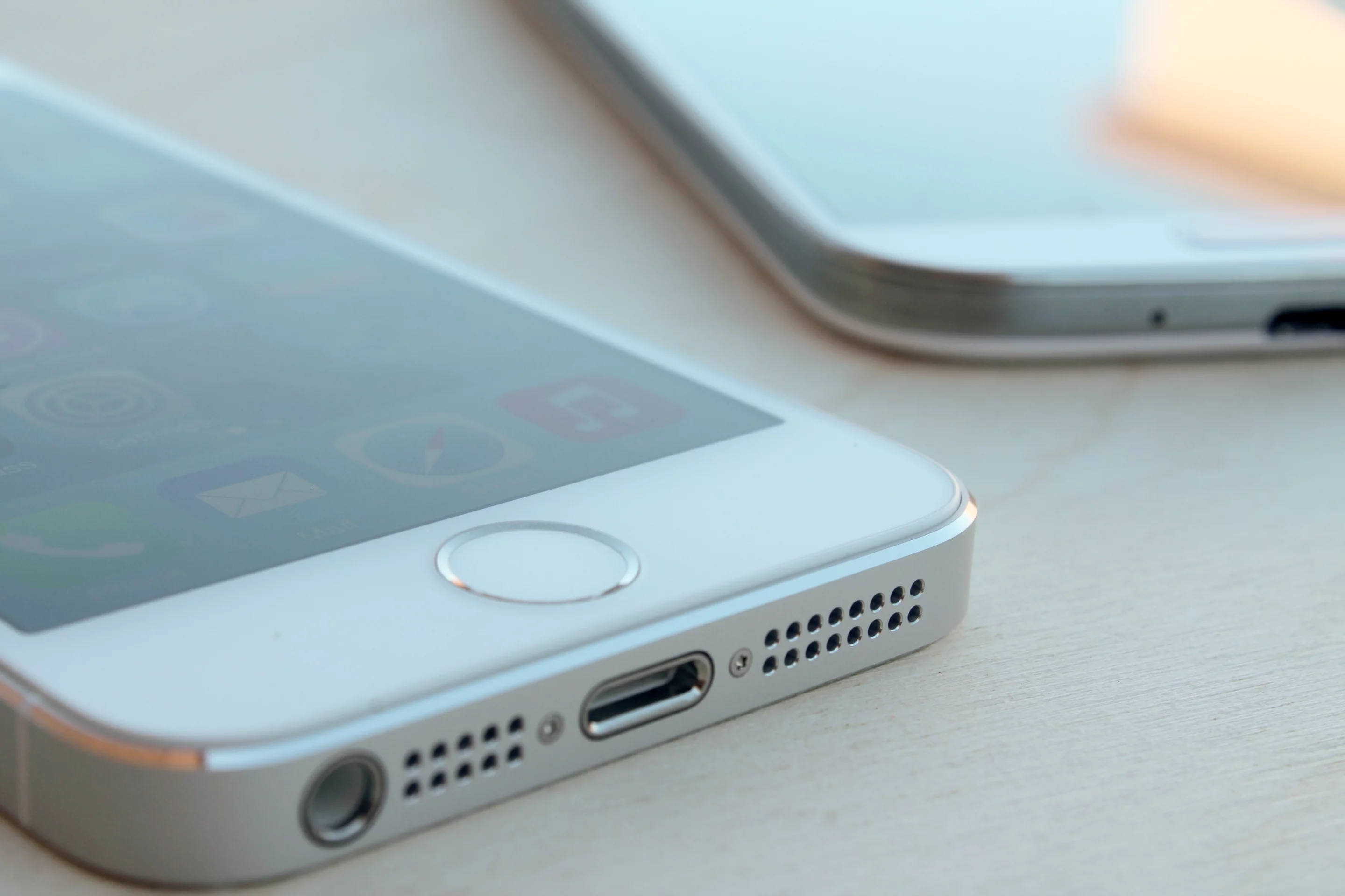 The iPhone 5s' Touch ID fingerprint sensor lives beneath its redesigned home button
