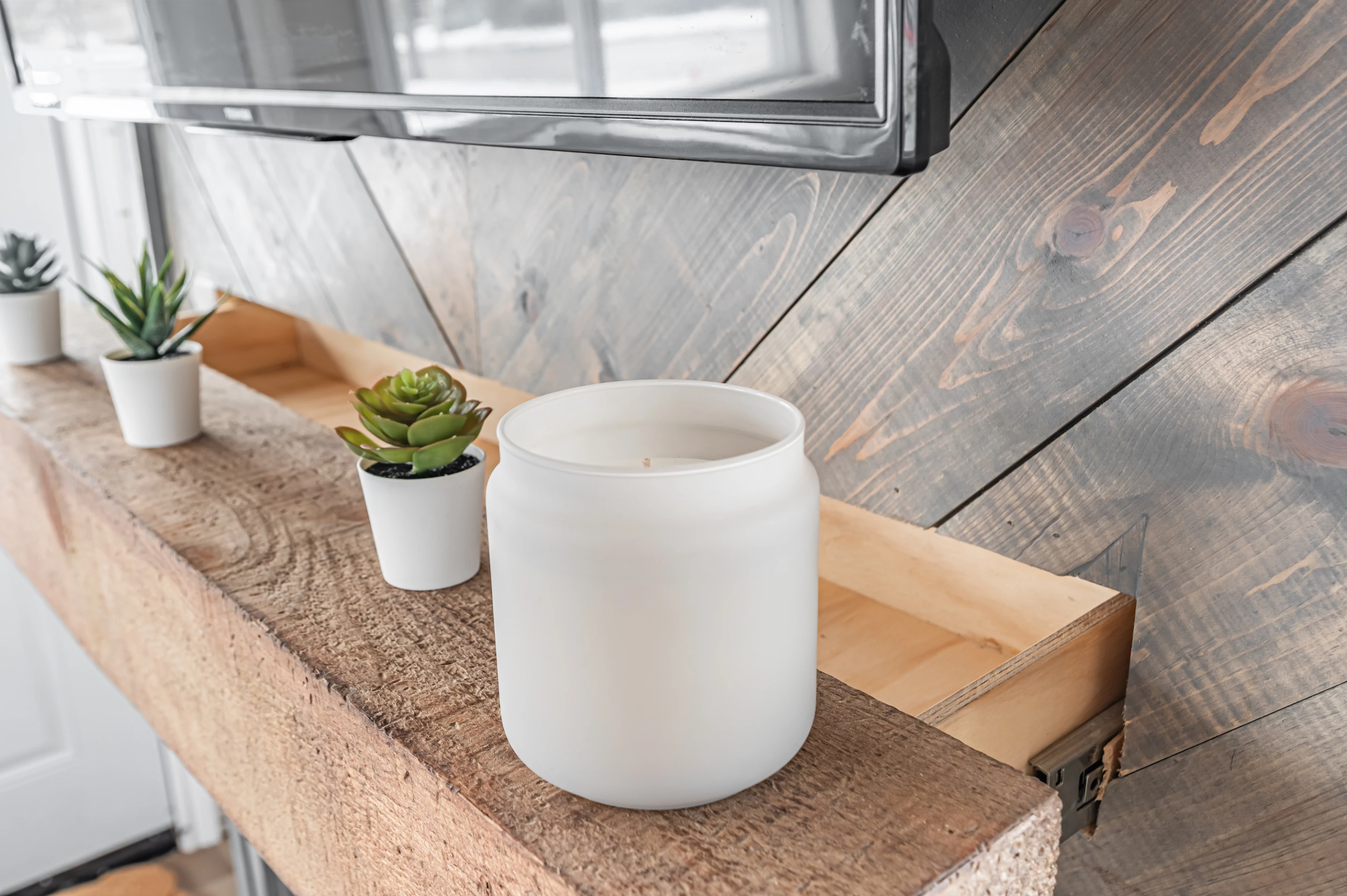 The Paddock Paradise's fireplace mantelpiece functions as a hidden storage drawer