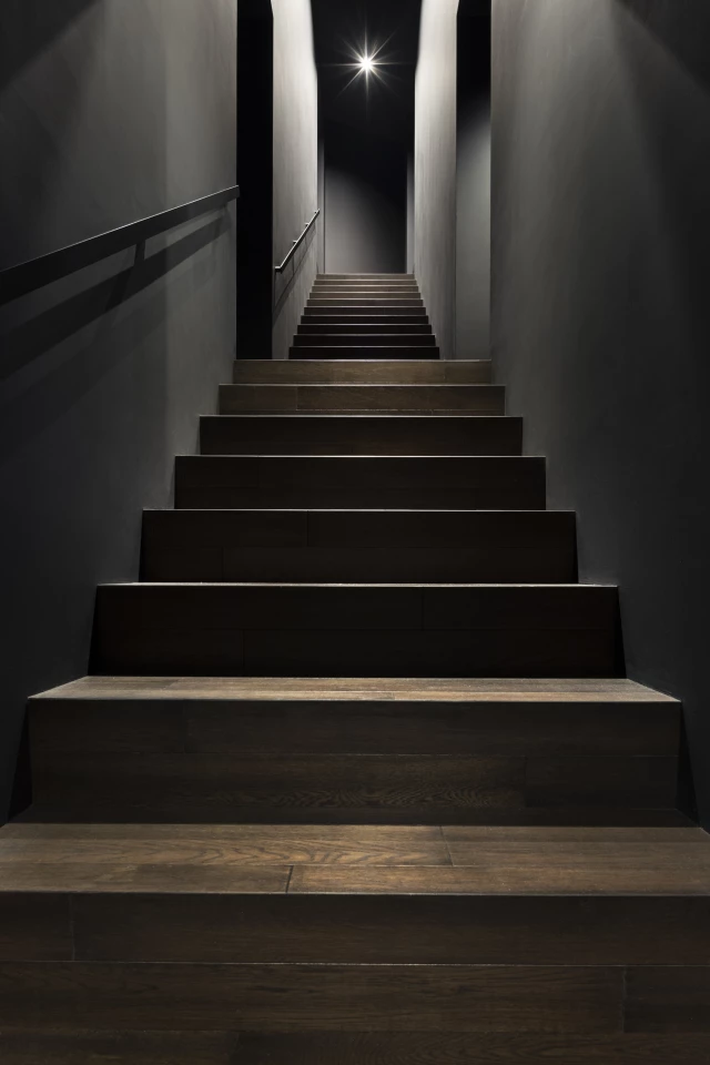 The Stairway House's large staircase actually houses another staircase that's used to move between floors in the house