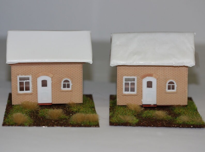 The research was carried out to scale on small model railway houses (Photo: Rotzetter ACC / Advanced Materials)