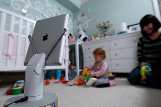 KUBI could be used to keep an eye on a toddler while away, so long as they stay in the same general area