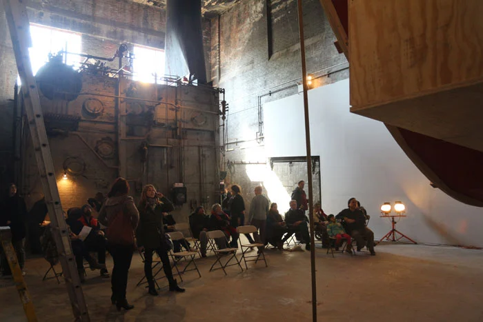 In Orbit features a large 7.6 m (25 ft) wheel constructed from wood and steel (Photo: Pierogi Gallery)