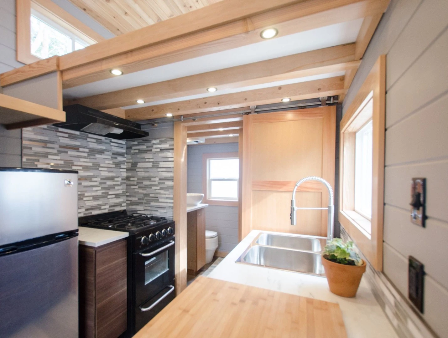 The Blue Heron's kitchen includes a four-burner propane range cooker