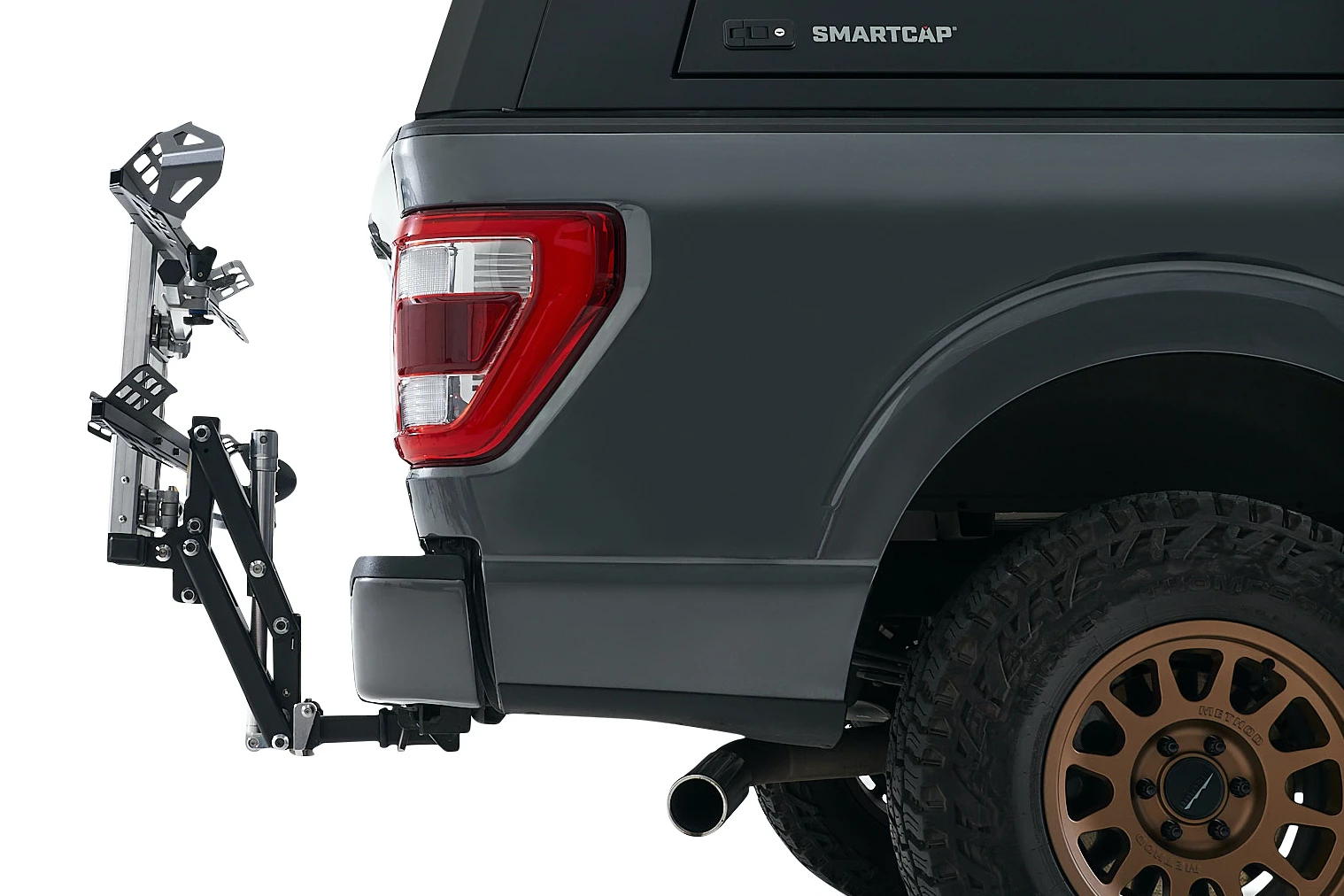 The tray attachment folds flat against the vehicle when not in use