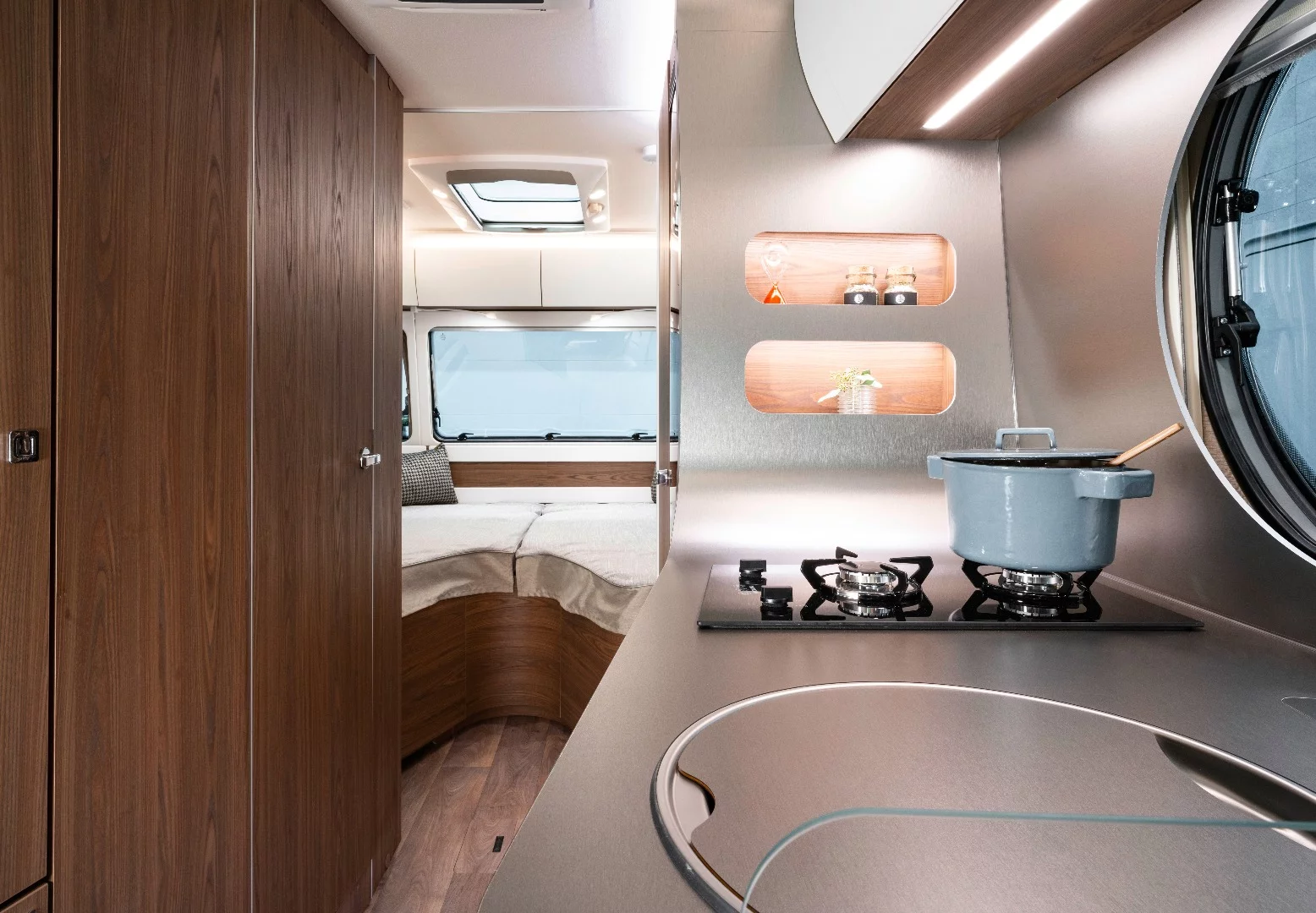 Shelves recessed into the kitchen wall