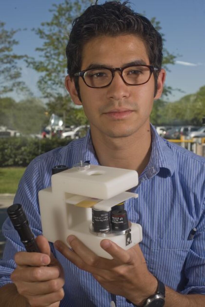 Andrew Miller and the prototype of his Global Focus microscope