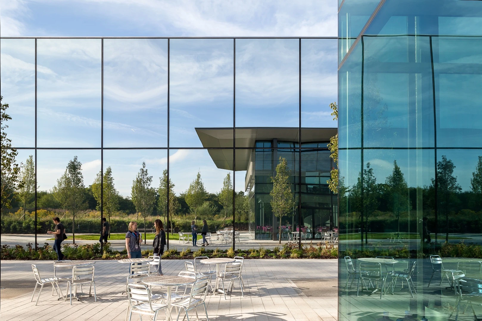Highly-reflective glazed panels are installed to help protect Dyson's new projects from prying eyes