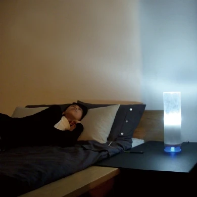 The light escapes from the sides and top of the device