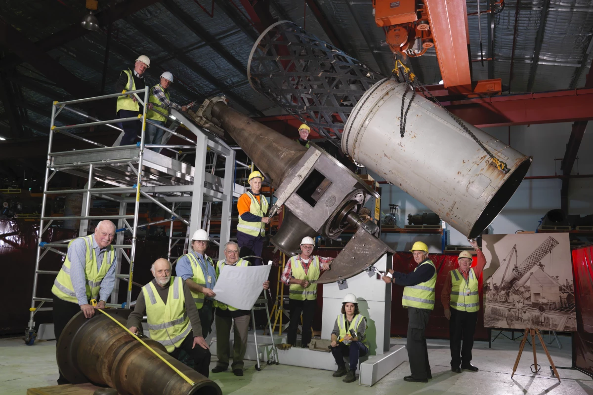 Volunteers and staff with components of the Great Melbourne Telescope at Moreland Annexe
