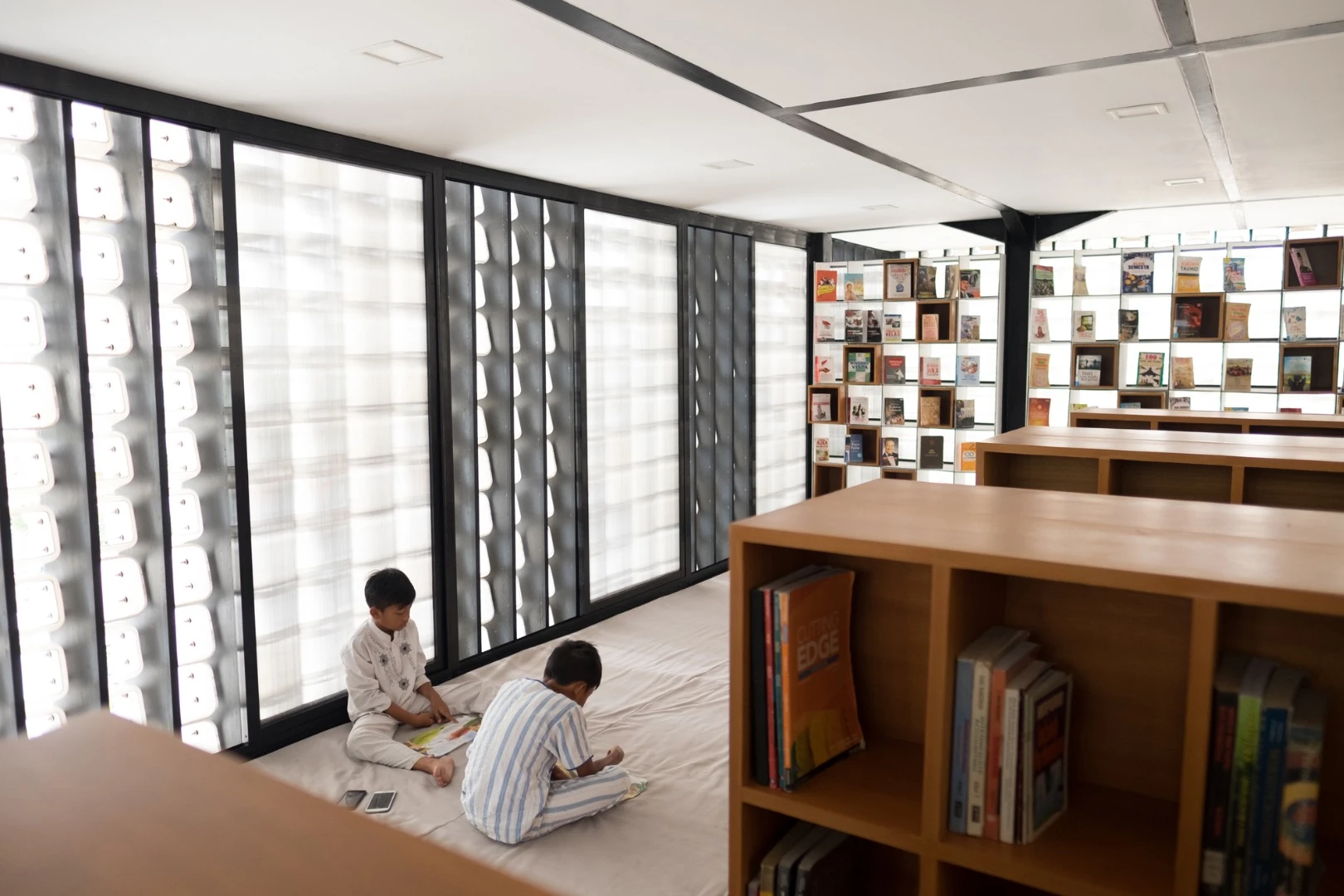The Microlibrary measures 120 sq m (1,291 sq ft)