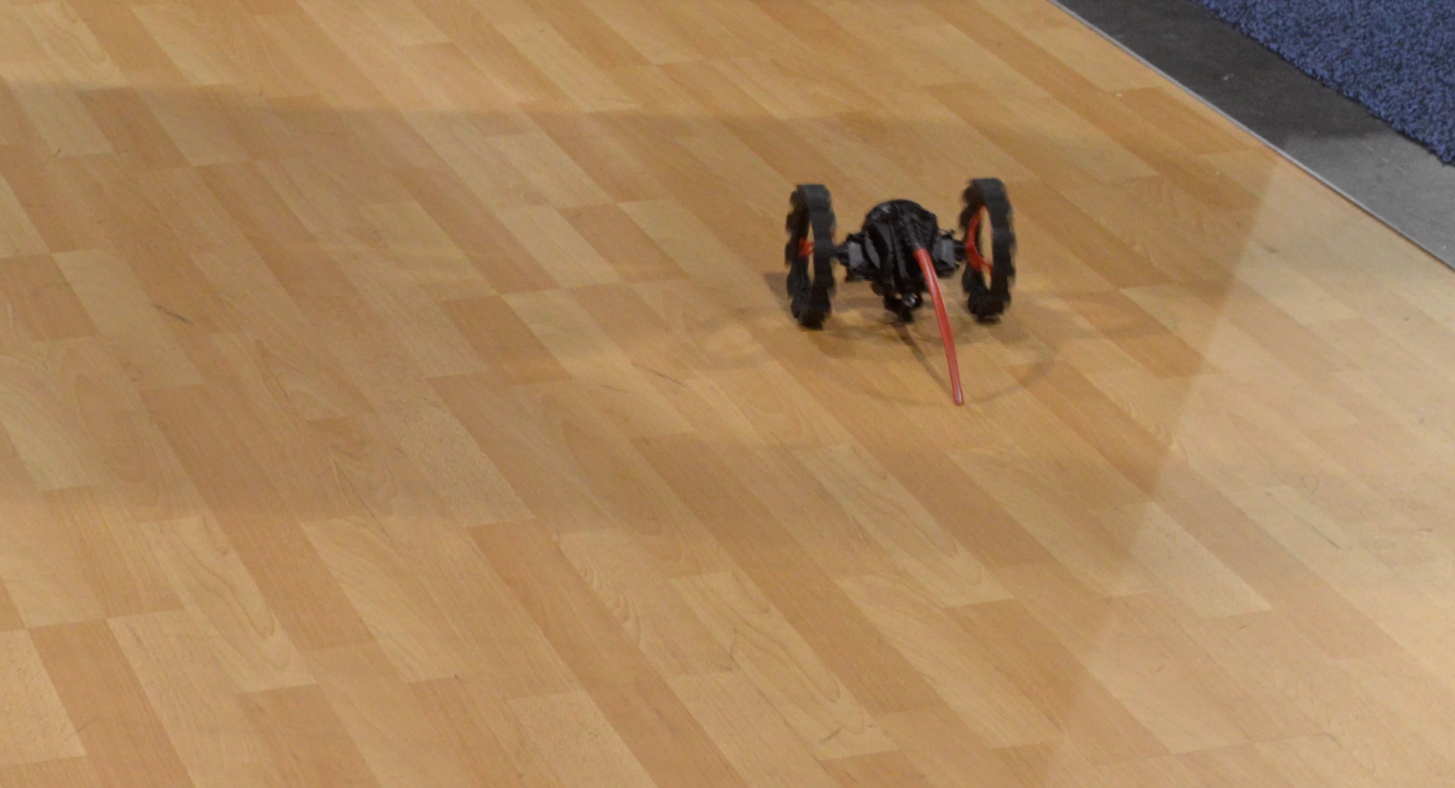 The all-terrain Minidrone explores the floor of Parrot's booth (Photo: C.C. Weiss/Gizmag)