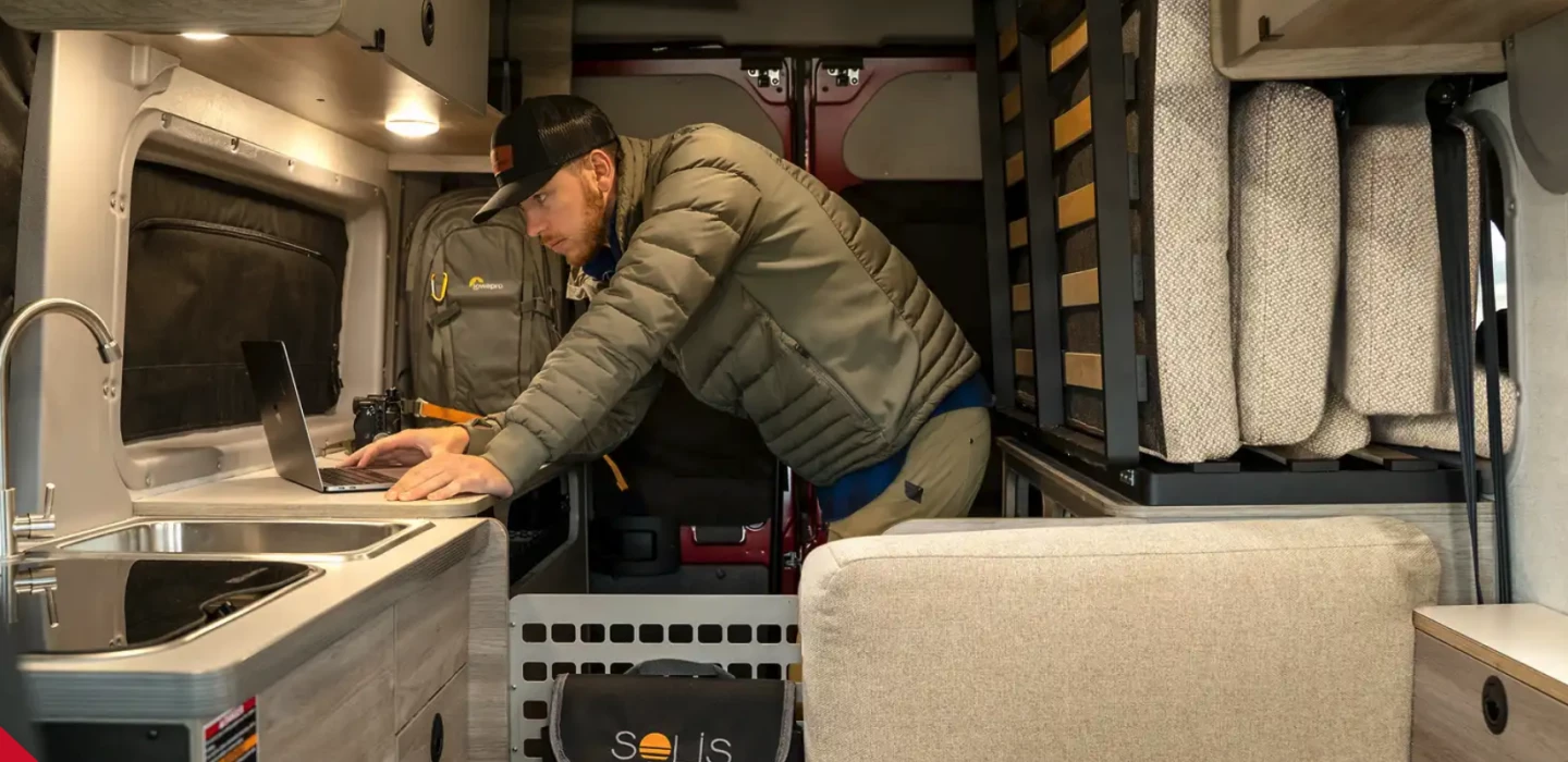 The passenger-side bed platform doubles as a counter and workbench