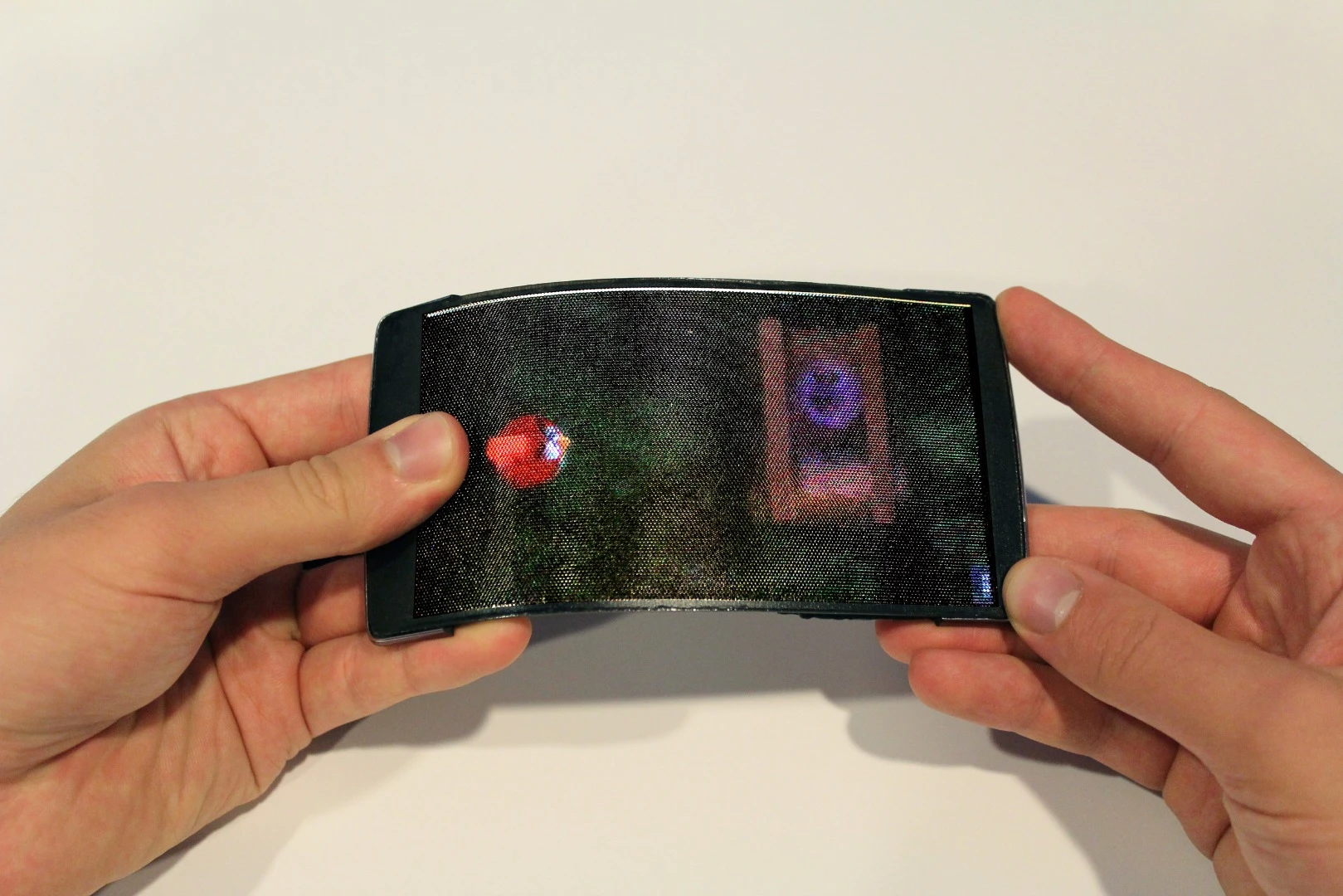 Bending the phone activates the slingshot in a 3D version of Angry Birds