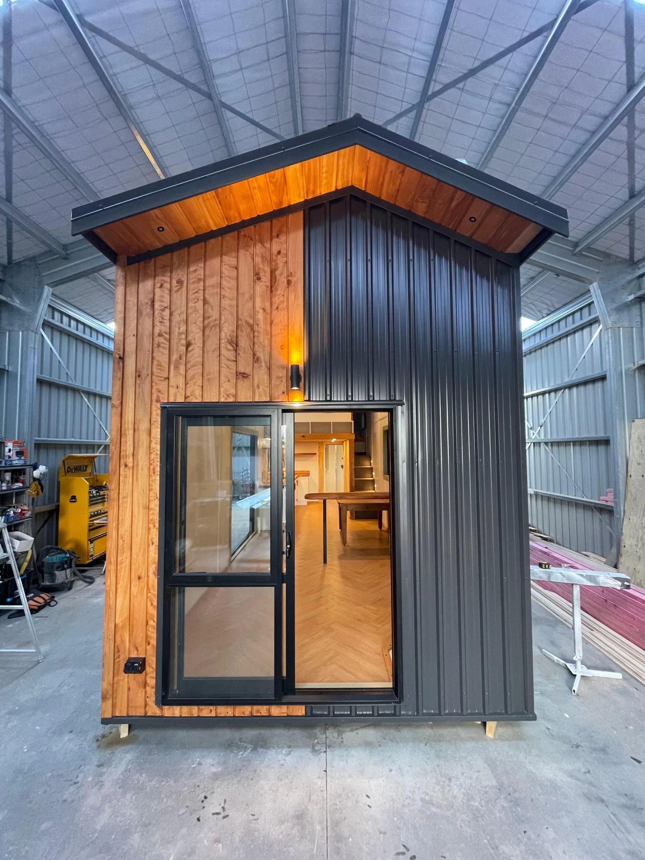 The Redwood's two glazed entrances help open up the tiny house to the outdoors