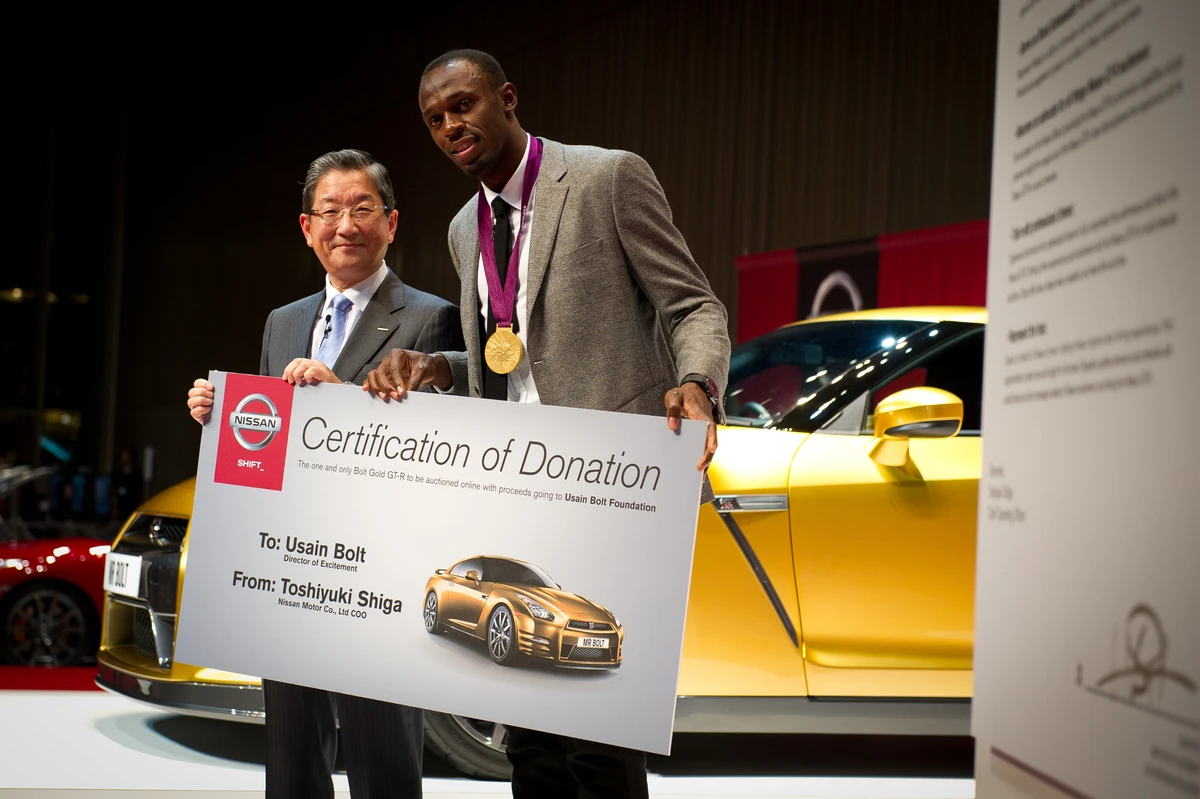 Usain with the Bolt Gold GT-R