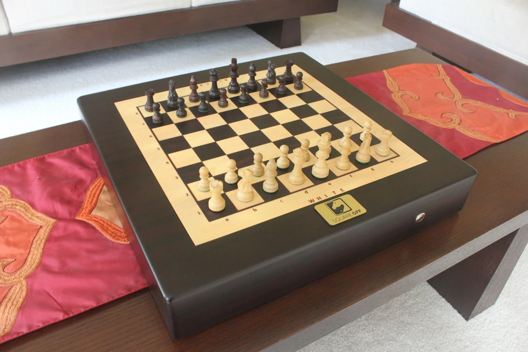 Underneath the familiar grid, Square Off moves pieces by itself with the help of a 2-axis robotic arm with a magnetic head attached