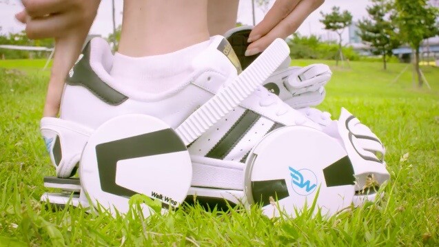 Each Walk Wing attaches to the user’s existing footwear via a heel strap, toe cover, and a ratcheting ankle strap