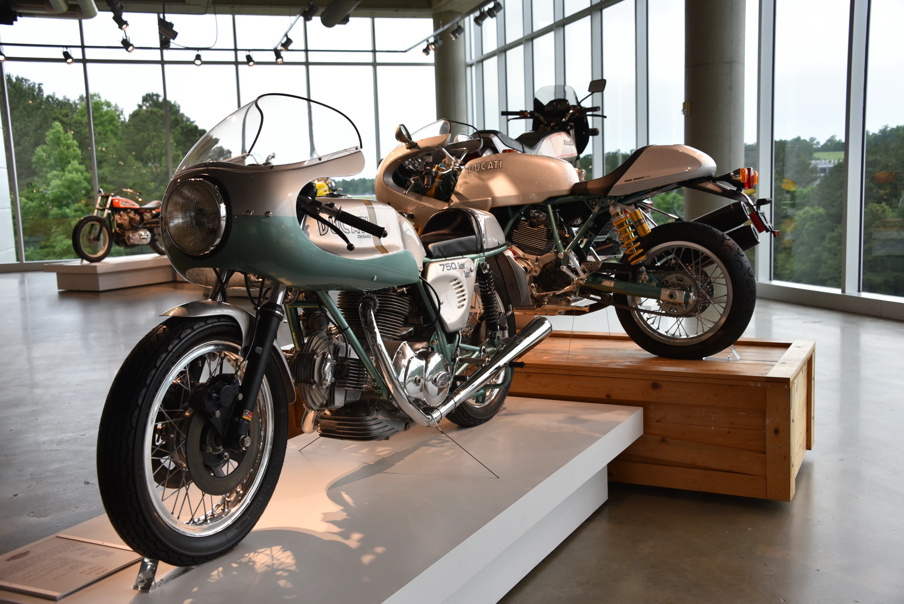 The 1974 Ducati 750 SS bevel twin (front), considered by many as the most desirable Ducati of all alongside the 2006 Ducati Paul Smart 1000 LE (rear), named for the racer that won Ducati it's most famous victory, the 1972 Imola