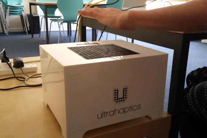 A test subject receives ultrasonic hand stimulation, that reportedly causes them to experience a given emotion (Photo: University of Sussex)